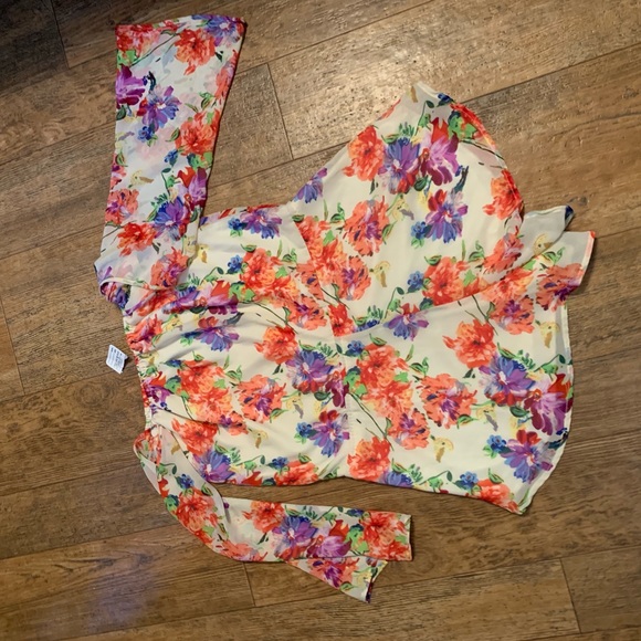 Floral Romper! Super cute! Never worn - Picture 3 of 3